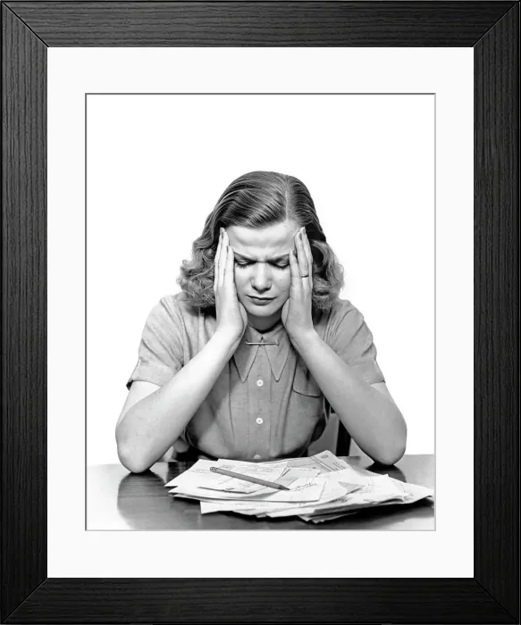 Framed Print : 1940s PANIC STRICKEN OVERWHELMED WOMAN HOLDING HER HEAD LOOKING DOWN AT PILE OF UNPAID BILLS ON THE TABLE Framed Print : 1940s PANIC STRICKEN OVERWHELMED WOMAN HOLDING HER HEAD LOOKING DOWN AT PILE OF UNPAID BILLS ON THE TABLE