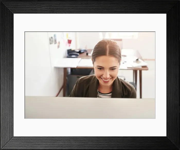 Framed Print : Working hard to achieve success. a young businesswoman working in her office Framed Print : Working hard to achieve success. a young businesswoman working in her office