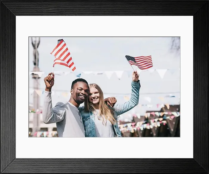 Framed Print : Multiethnic friends holding american flags outstretched hands Framed Print : Multiethnic friends holding american flags outstretched hands