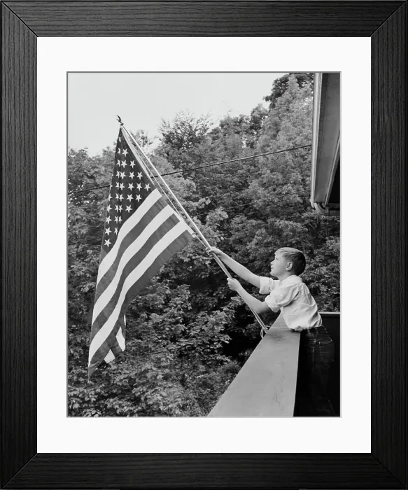 Framed Print : Boy holding an American flag, USA Framed Print : Boy holding an American flag, USA