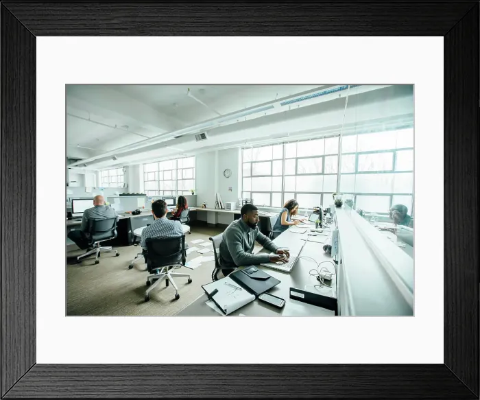 Framed Print : Business people working in busy office Framed Print : Business people working in busy office