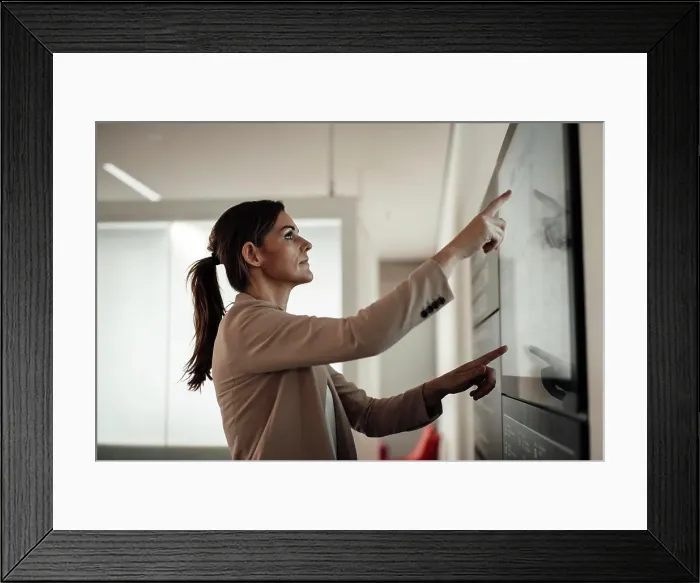 Framed Print : Businesswoman using digital screen and working at office