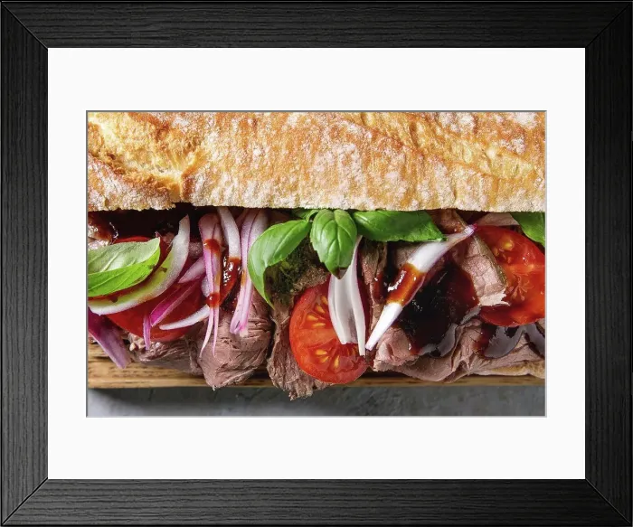 Framed Print : Close up of beef baguette sandwich with tomatoes, basil, red onion. Flat lay, space Framed Print : Close up of beef baguette sandwich with tomatoes, basil, red onion. Flat lay, space
