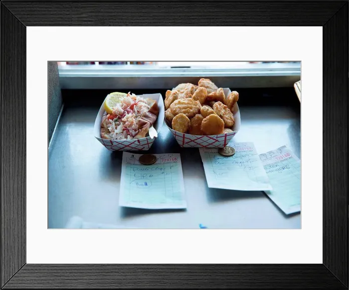 Framed Print : Prepared food by hatch in fast food trailer