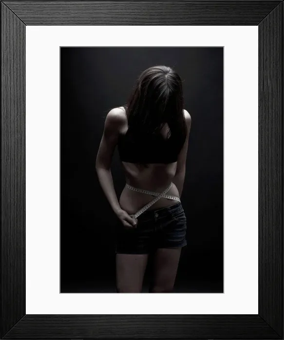 Framed Print : Anorexic teenage girl, conceptual image Framed Print : Anorexic teenage girl, conceptual image