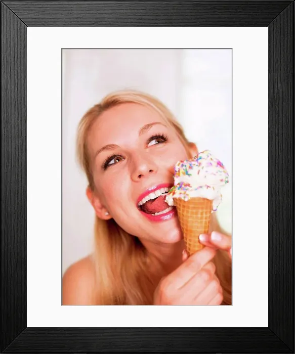 Framed Print : Woman licking ice cream Framed Print : Woman licking ice cream