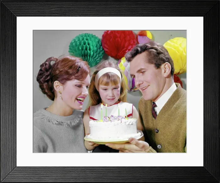 Framed Print : 1960s SMILING MOTHER AND FATHER WITH DAUGHTER READY TO BLOW OUT CANDLES ON BIRTHDAY CAKE PARTY DECORATIONS Framed Print : 1960s SMILING MOTHER AND FATHER WITH DAUGHTER READY TO BLOW OUT CANDLES ON BIRTHDAY CAKE PARTY DECORATIONS