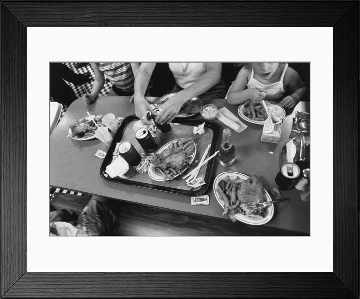 Framed Print : Family having junk food meal Framed Print : Family having junk food meal