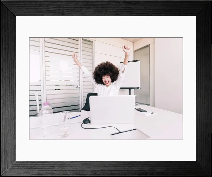 Framed Print : Businesswoman celebrating Framed Print : Businesswoman celebrating