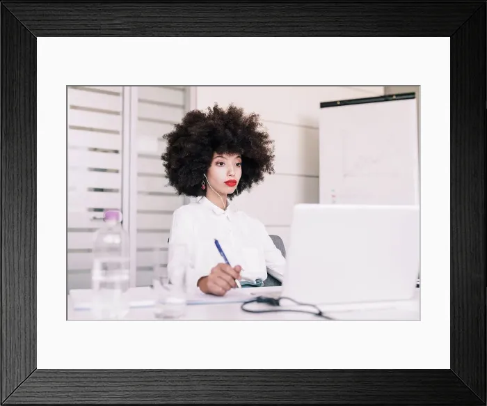Framed Print : Businesswoman working on laptop Framed Print : Businesswoman working on laptop