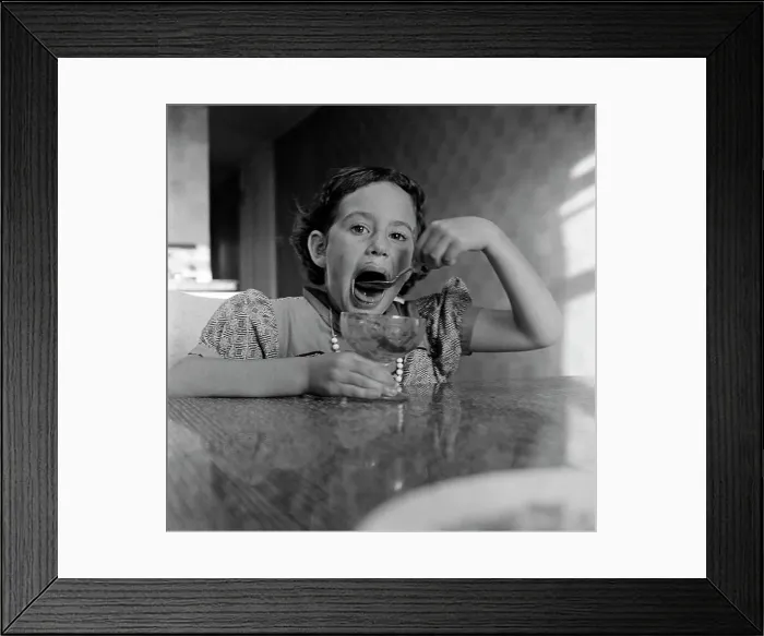 Framed Print : Girl eating ice cream Framed Print : Girl eating ice cream