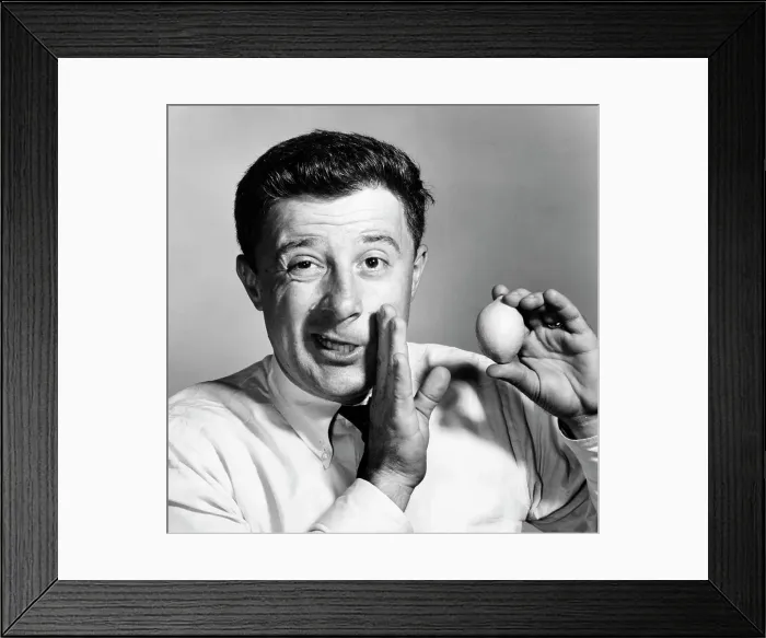 Framed Print : Studio portrait of businessman holding lemon Framed Print : Studio portrait of businessman holding lemon