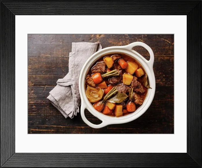 Framed Print : Beef meat stewed with potatoes, carrots and spices in ceramic pot on wooden background Framed Print : Beef meat stewed with potatoes, carrots and spices in ceramic pot on wooden background