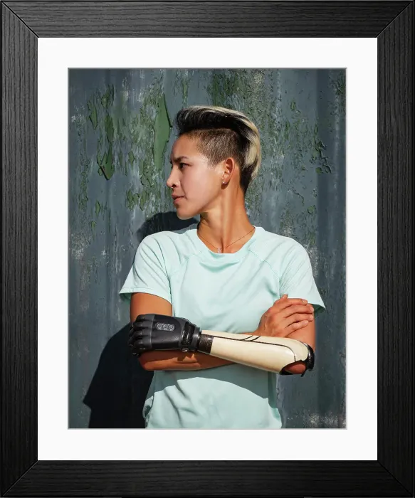 Framed Print : Portrait of athlete woman with prosthetic arm Framed Print : Portrait of athlete woman with prosthetic arm