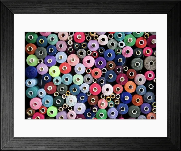 Framed Print : Pile of cotton reels Framed Print : Pile of cotton reels