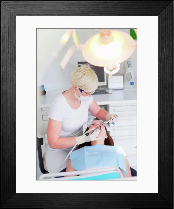Framed Print : Dentist working on patients teeth Framed Print : Dentist working on patients teeth