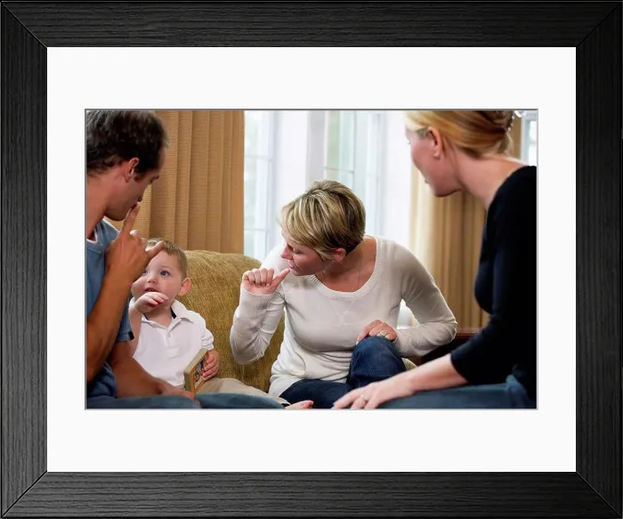 Framed Print : Family conversing in sign language