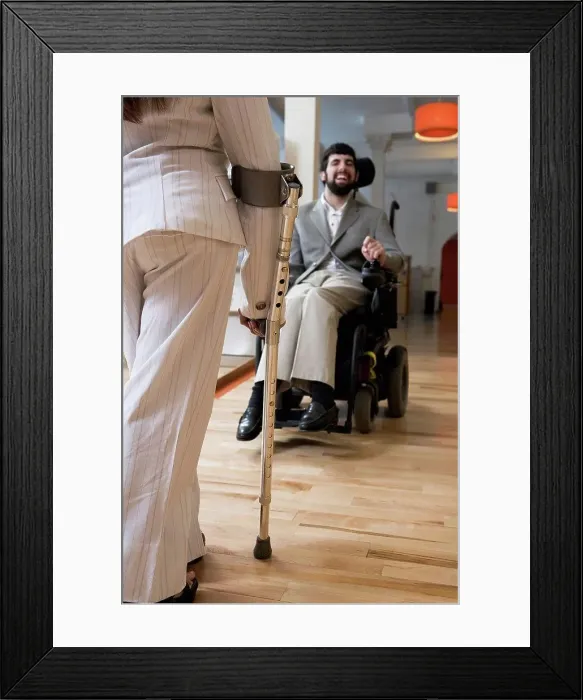 Framed Print : View of a handicapped man and woman in conversation Framed Print : View of a handicapped man and woman in conversation