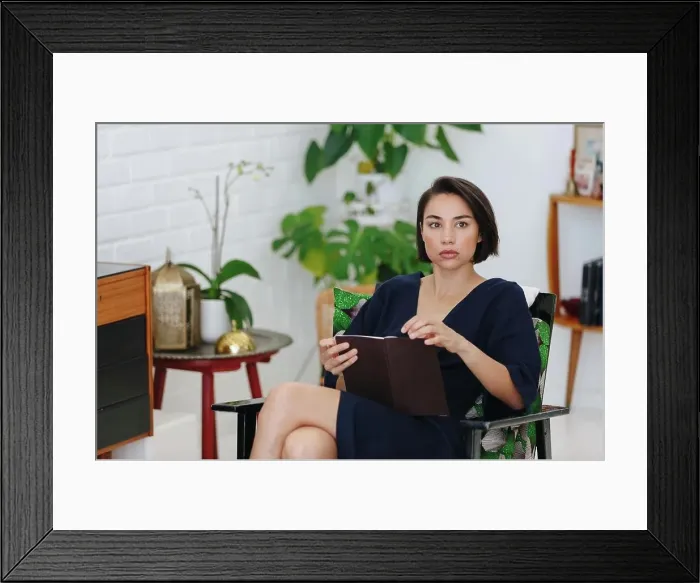 Framed Print : Businesswoman preparing paperwork in office Framed Print : Businesswoman preparing paperwork in office