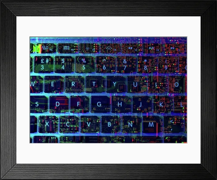 Framed Print : Double exposure of the inside and out of a laptop computer showing the electronic components under the keyboard Framed Print : Double exposure of the inside and out of a laptop computer showing the electronic components under the keyboard