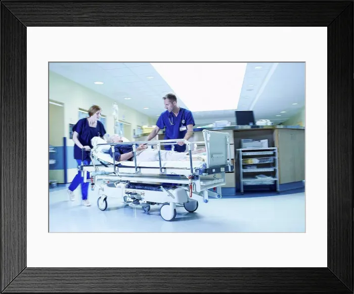Framed Print : Two medics rushing with gurney in hospital emergency room Framed Print : Two medics rushing with gurney in hospital emergency room