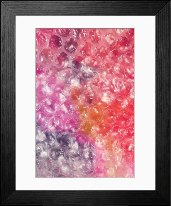 Framed Print : Bubble wrap over multicolor background Framed Print : Bubble wrap over multicolor background