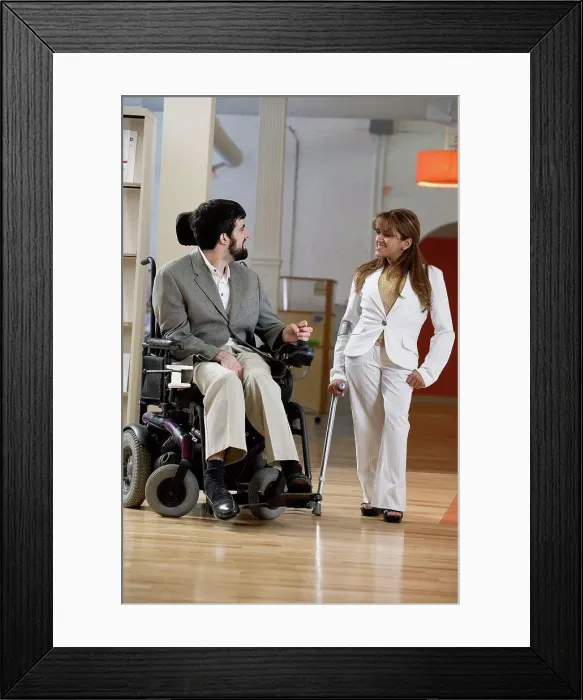 Framed Print : View of a man with Cerebral Palsy and woman conversing Framed Print : View of a man with Cerebral Palsy and woman conversing