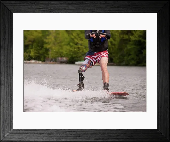 Framed Print : Athlete with an artificial leg water skiing Framed Print : Athlete with an artificial leg water skiing