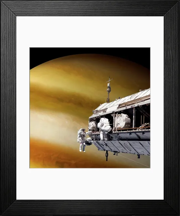Framed Print : An artist's depiction of a team of astronauts performing work on a space station while orbiting a large alien planet Framed Print : An artist's depiction of a team of astronauts performing work on a space station while orbiting a large alien planet