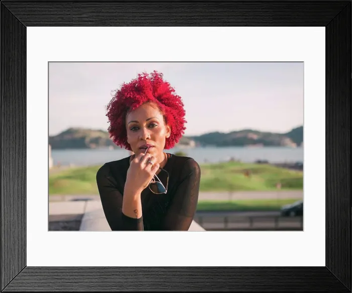 Framed Print : Portrait confident, serious woman with red hair Framed Print : Portrait confident, serious woman with red hair