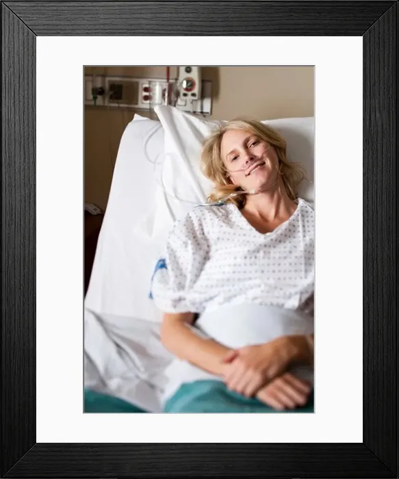 Framed Print : Woman in hospital bed