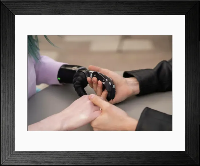 Framed Print : Young couple holding hands on table Framed Print : Young couple holding hands on table