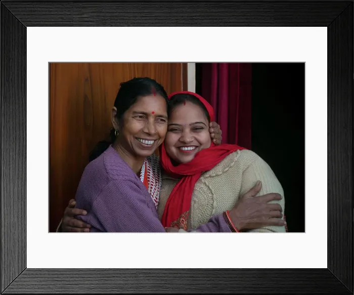 Framed Print : indian mother and daughter hugging each other, India