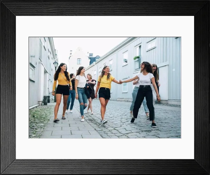 Framed Print : Full length of friends enjoying while traveling in city Framed Print : Full length of friends enjoying while traveling in city