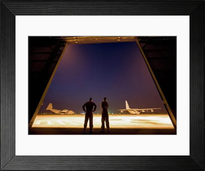 Framed Print : Two United States Marine aviators scan the flight line on which two KC-130J Super Hercules sit parked at Kuantan Air Framed Print : Two United States Marine aviators scan the flight line on which two KC-130J Super Hercules sit parked at Kuantan Air