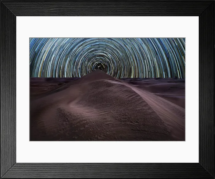 Framed Print : Concentric circumpolar star trail above sand dunes in the Rub al Khali desert, Oman, Middle East