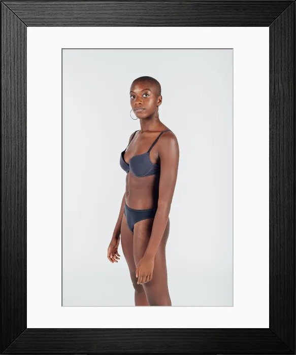 Framed Print : Portrait of a young woman wearing underwear Framed Print : Portrait of a young woman wearing underwear