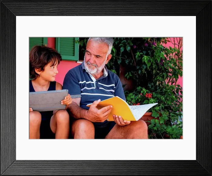 Framed Print : Grandfather sitting with grandson on front door steps Framed Print : Grandfather sitting with grandson on front door steps
