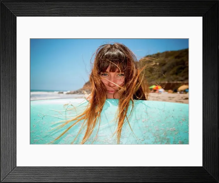 Framed Print : Young woman with surfboard Framed Print : Young woman with surfboard