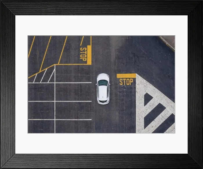 Framed Print : Aerial view of car in parking lot Framed Print : Aerial view of car in parking lot