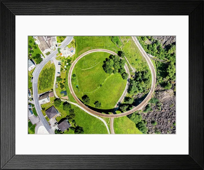 Framed Print : Aerial of the Brusio spiral viaduct, UNESCO World Heritage Site, Rhaetian Railway, Switzerland, Europe Framed Print : Aerial of the Brusio spiral viaduct, UNESCO World Heritage Site, Rhaetian Railway, Switzerland, Europe