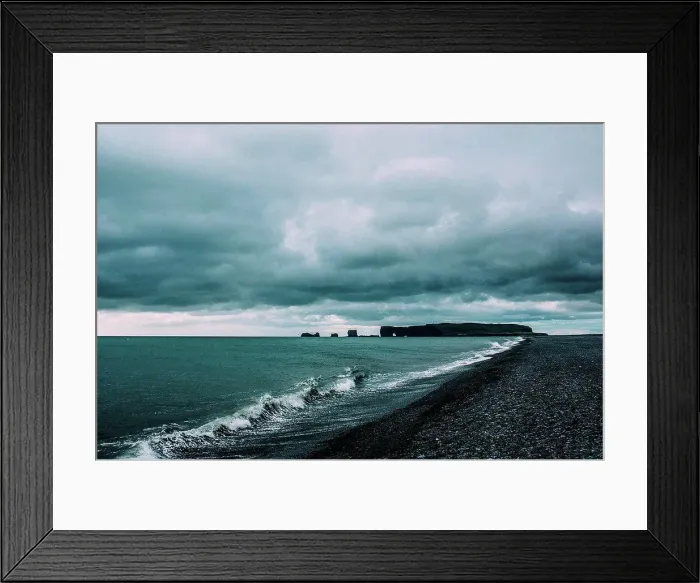 Framed Print : Ocean waves on coastline under dramatic sky, Vik, Iceland Framed Print : Ocean waves on coastline under dramatic sky, Vik, Iceland
