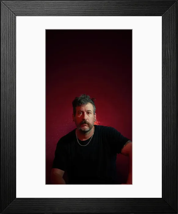 Framed Print : Studio portrait of mature man Framed Print : Studio portrait of mature man