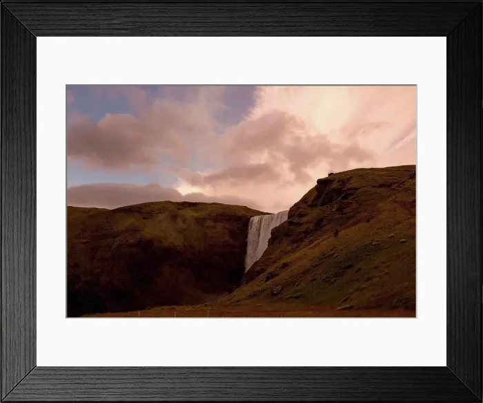 Framed Print : Waterfall of river flowing over mountain range at sunset, Iceland Framed Print : Waterfall of river flowing over mountain range at sunset, Iceland