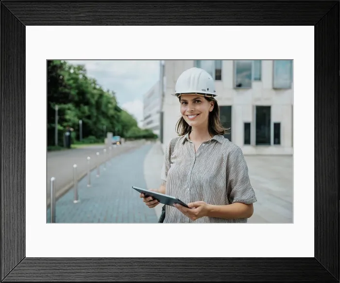 Framed Print : Architect holding tablet PC at construction site Framed Print : Architect holding tablet PC at construction site