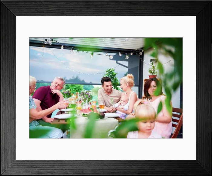 Framed Print : Three generation family having lunch on patio Framed Print : Three generation family having lunch on patio
