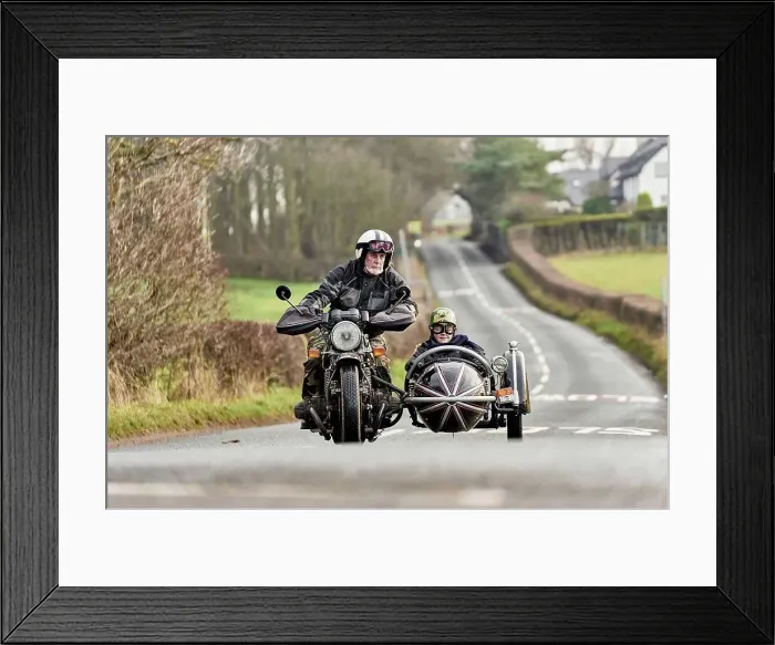 Framed Print : Senior man and grandson riding motorcycle and sidecar on rural road