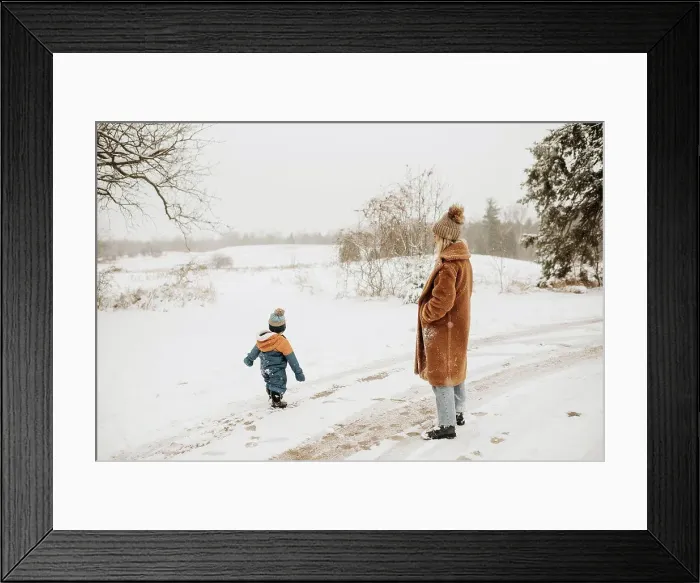 Framed Print : Canada, Ontario, Mother and son on snowy road