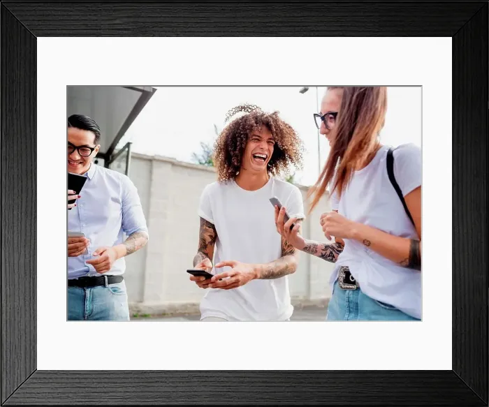 Framed Print : Mixed race group of friends hanging out together in town Framed Print : Mixed race group of friends hanging out together in town