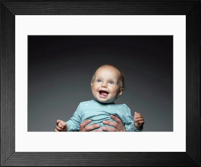 Framed Print : Portrait happy cute baby boy looking up Framed Print : Portrait happy cute baby boy looking up